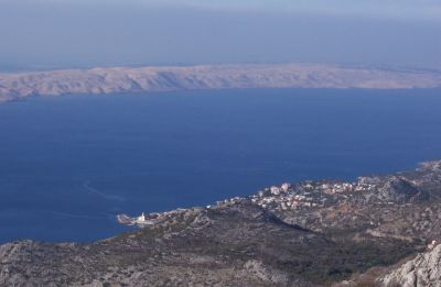 This is a peaceful village called Karlobag and the long island Pag in the distance